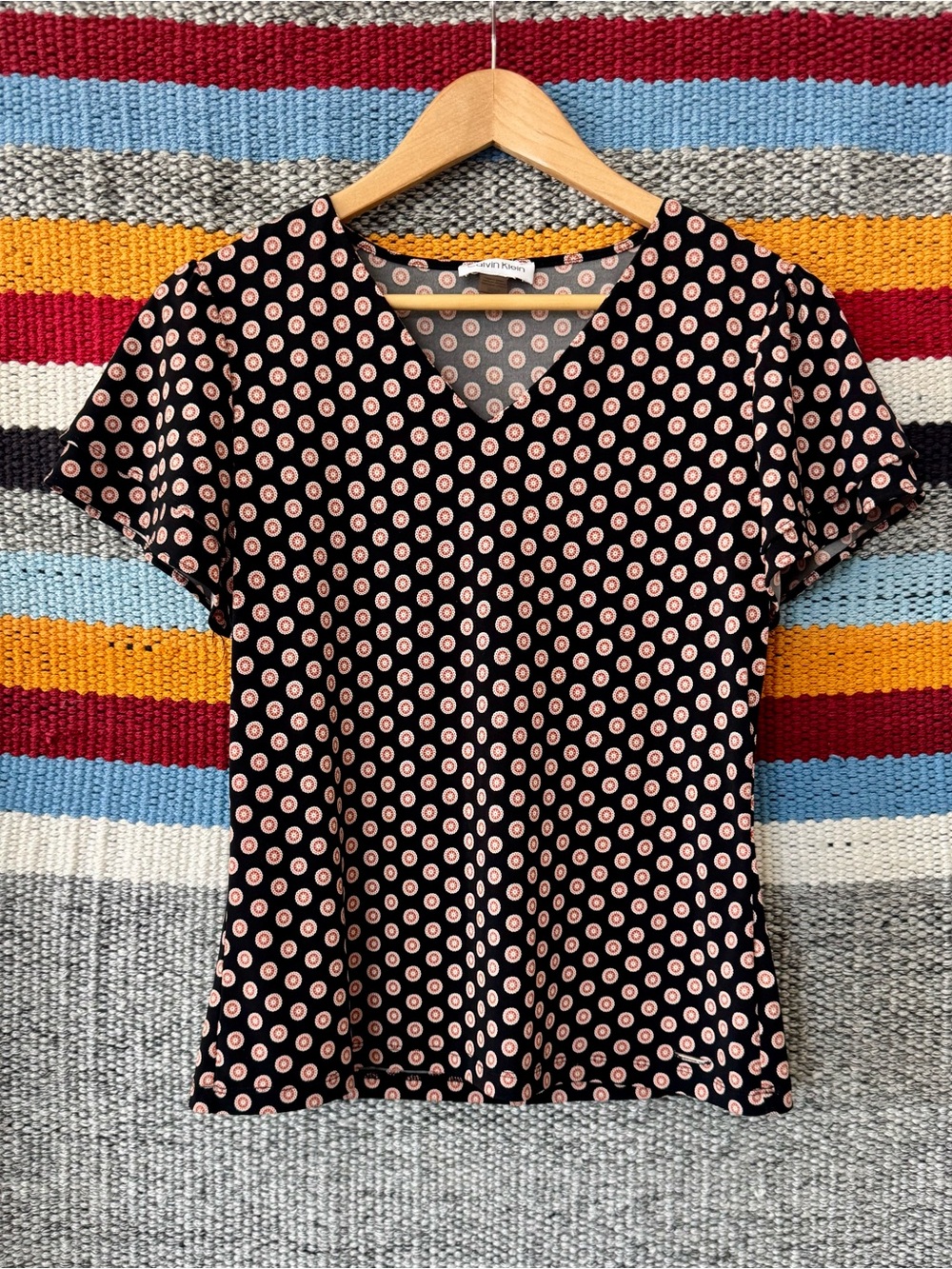 Calvin Klein V-Neck Short Sleeve Top with Red/Orange/Pink Dot Design